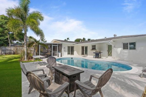 Pool home with putting green and home gym office